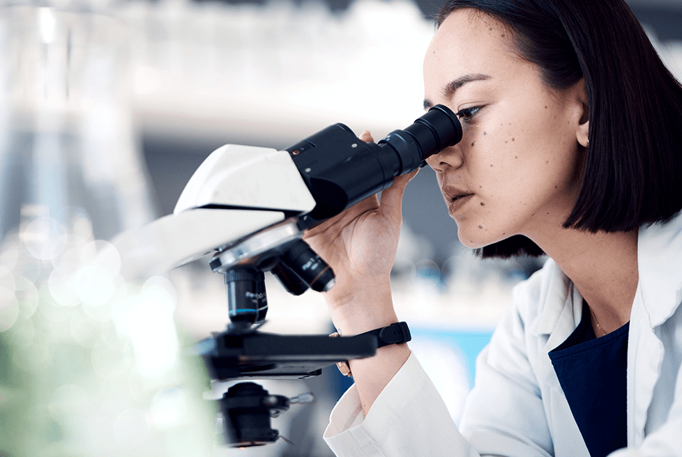 Woman using a microscope